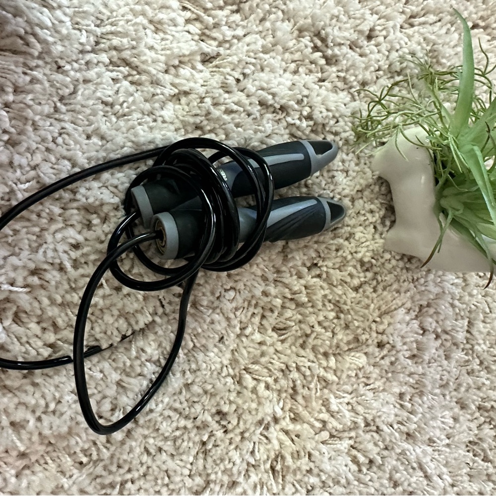 Exercise athletic gym workout routine jump rope at home equipment. One s…